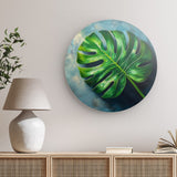 Rundes Wandbild | Grüne Stille - Monstera-Blatt vor ruhigem Farbhintergrund