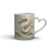 Tasse (Herzgriff) | Meerespoesie in Sandfarben - Seepferdchen auf Muschelrelief